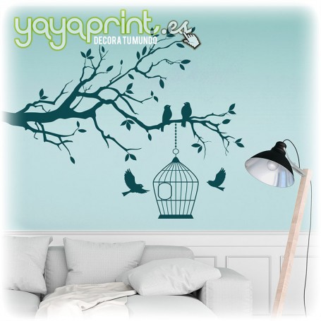 Pegatina de pared de rama de árbol con una jaula y pájaros libres.